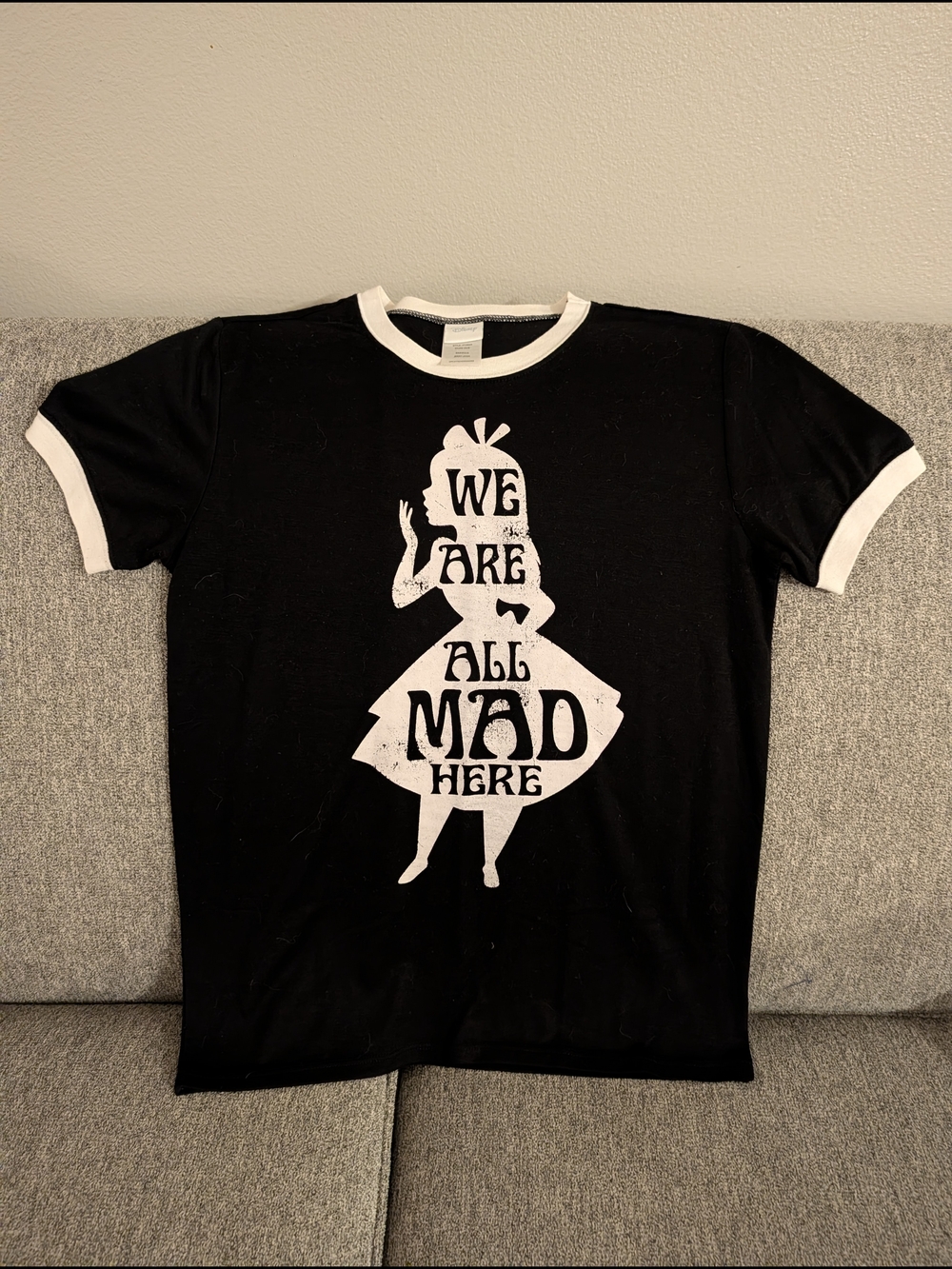 Disney Black & White Ringer 'We Are All Mad Here' Short Sleeve Graphic Tee